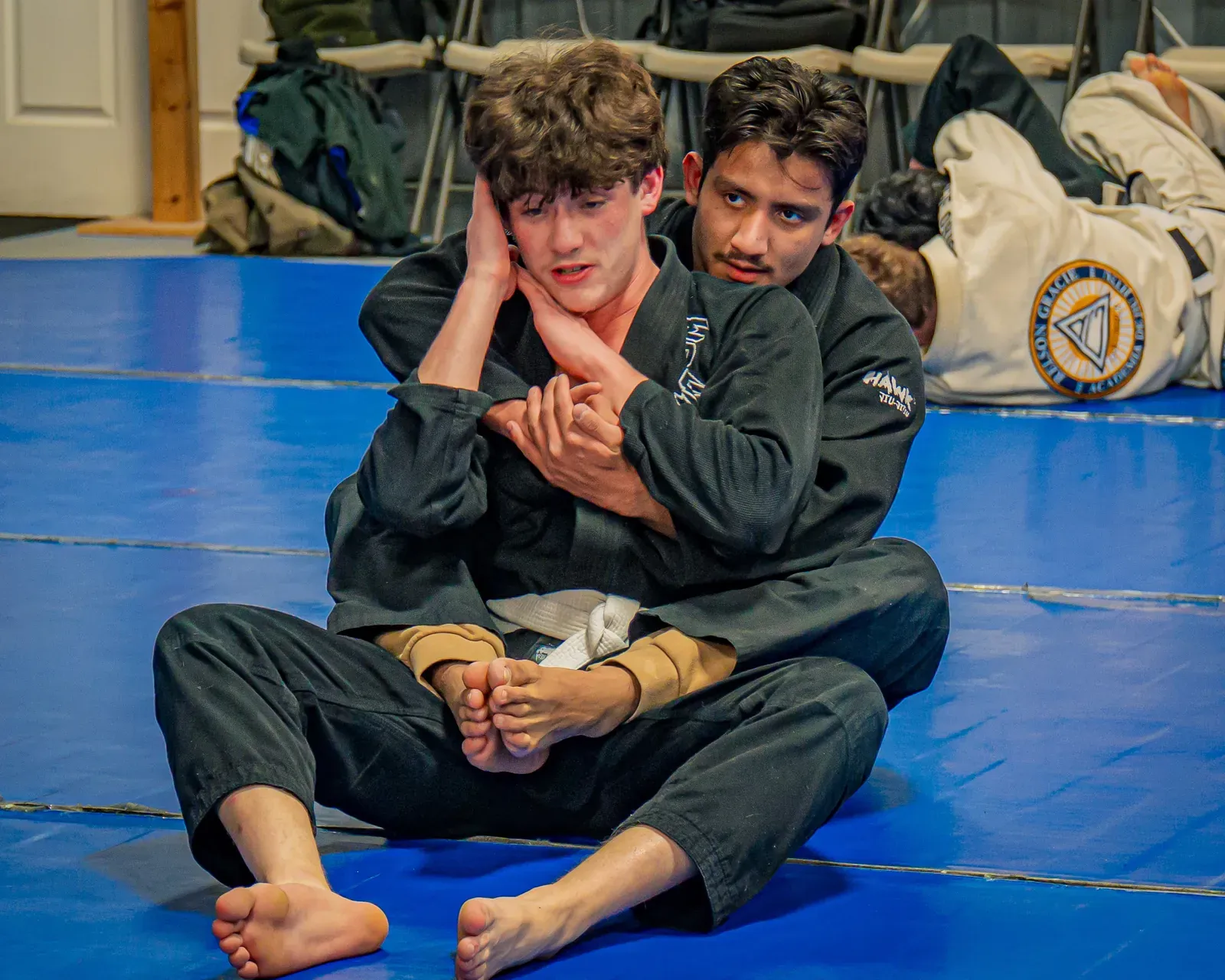 Two young jiu-jitsu students drilling a back take, a short drive from Granville