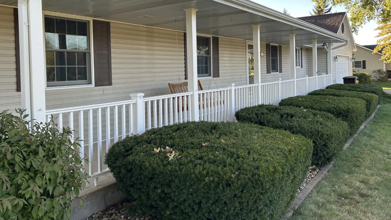 Front porch with white railing