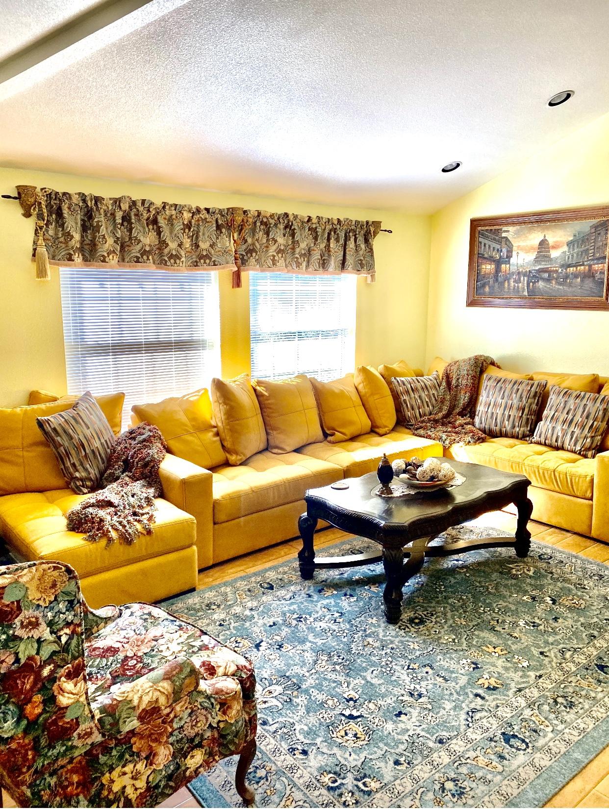 A bright, sunny living room inside the care home
