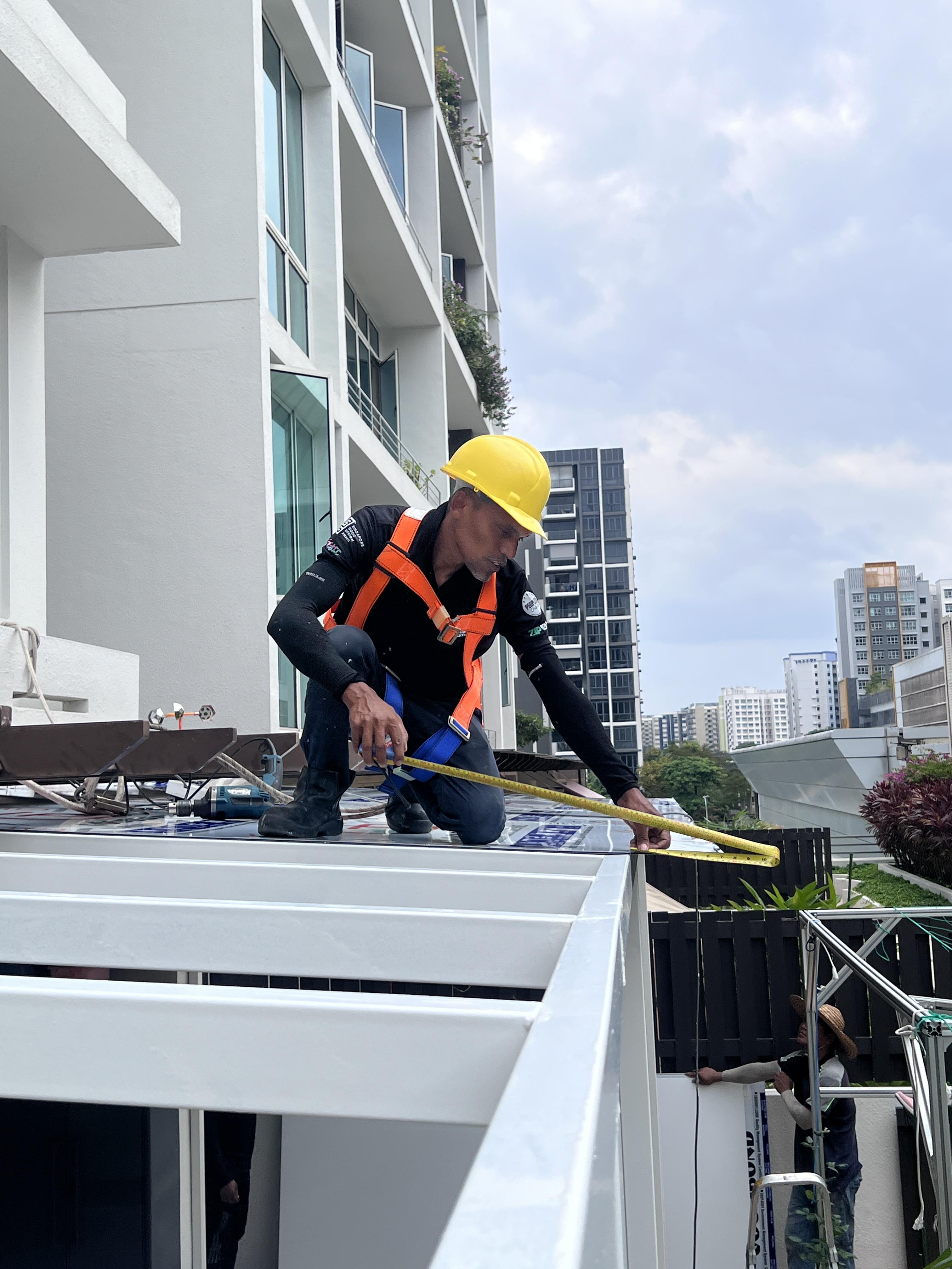Our installers fixing a roof frame on site