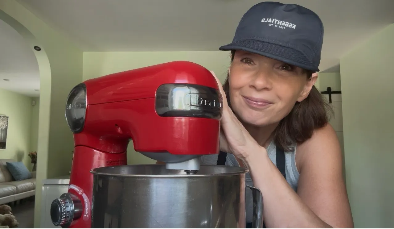 Lorna Simon, founder of Pure Radiance Tallow, beside her red stand mixer in Regina, Saskatchewan