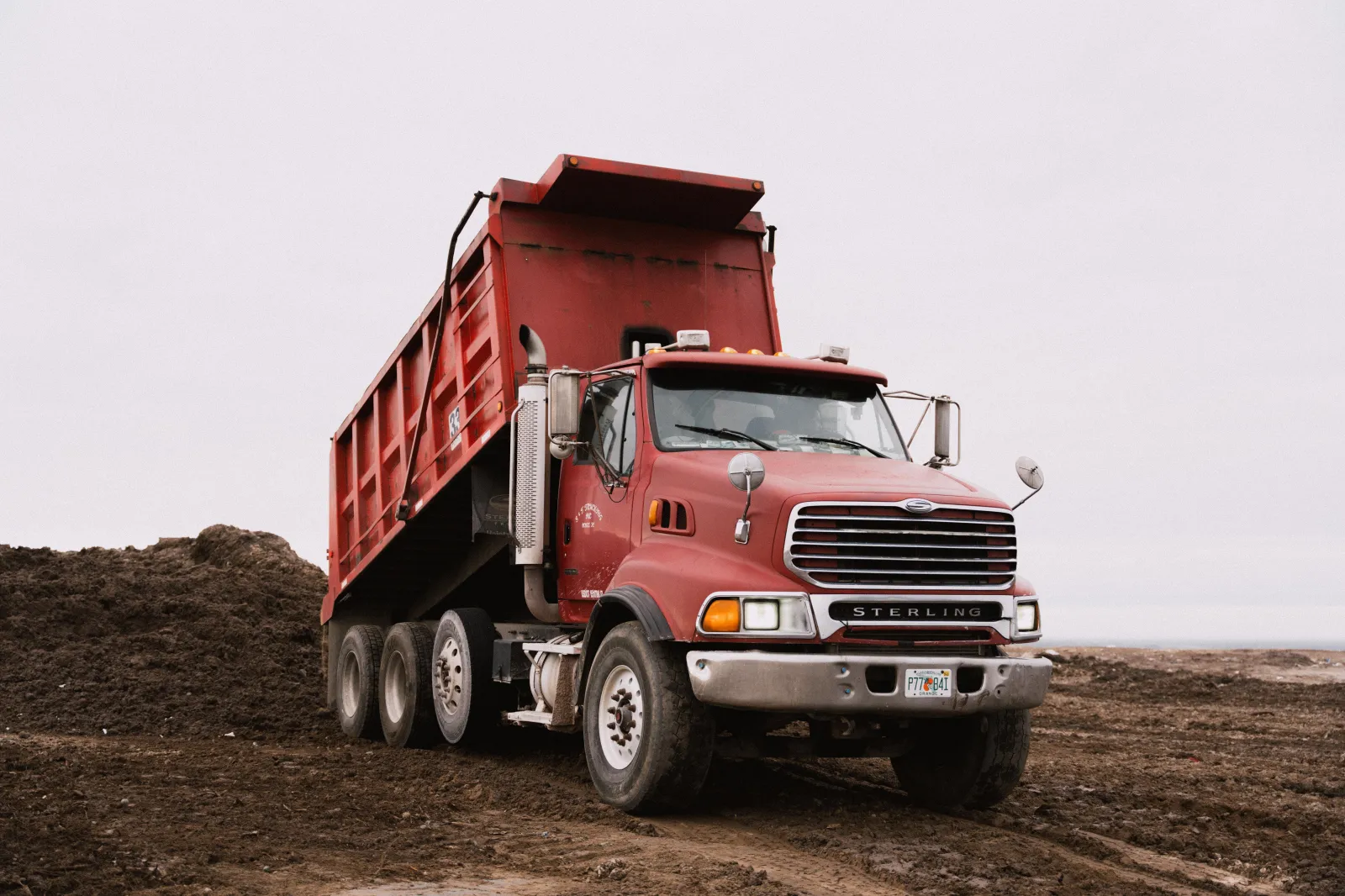 S&T dump truck on a job site