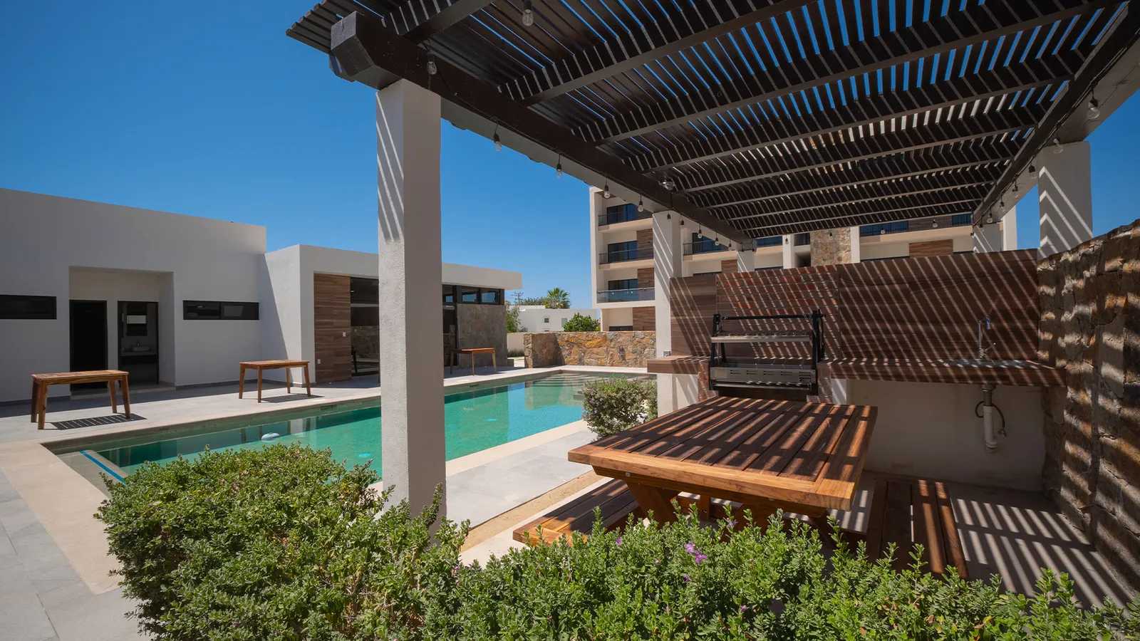 Zona de asadores con pérgola