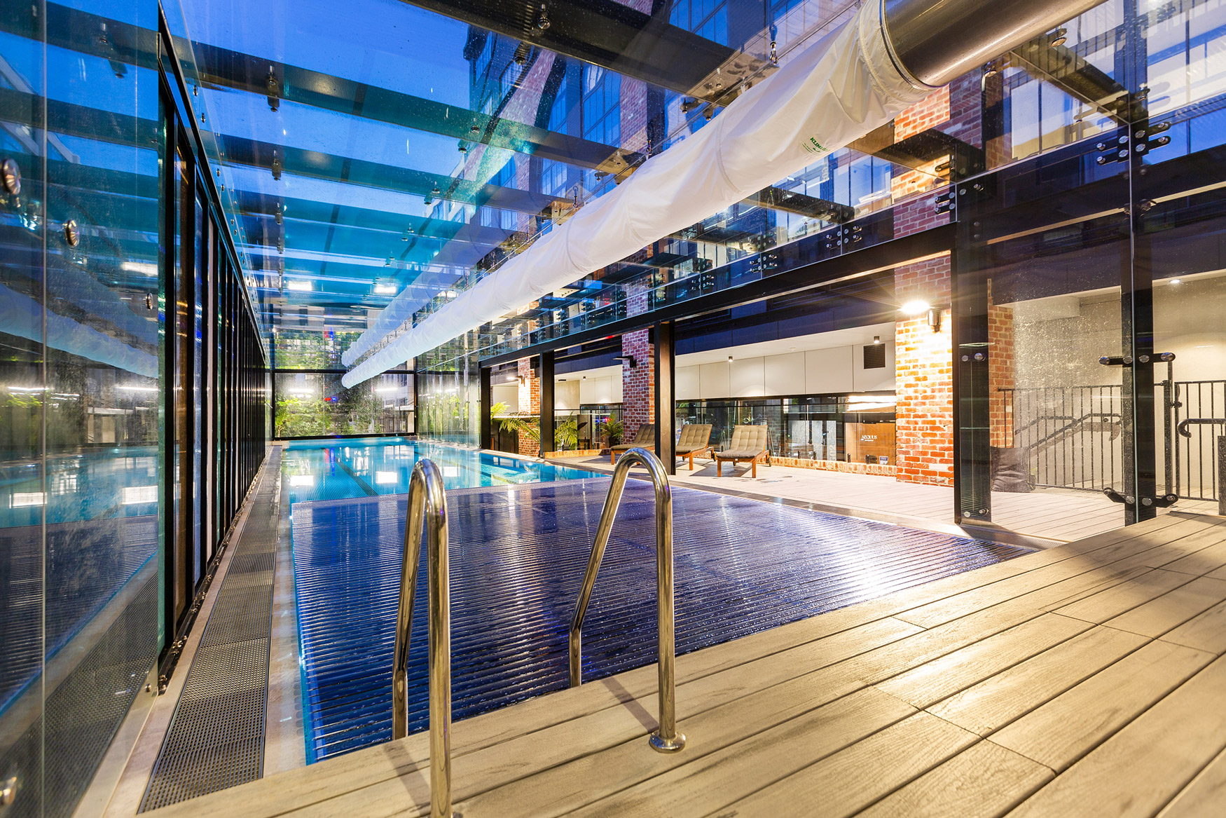 The Woolstore building and the KGS pool pavilion at dusk