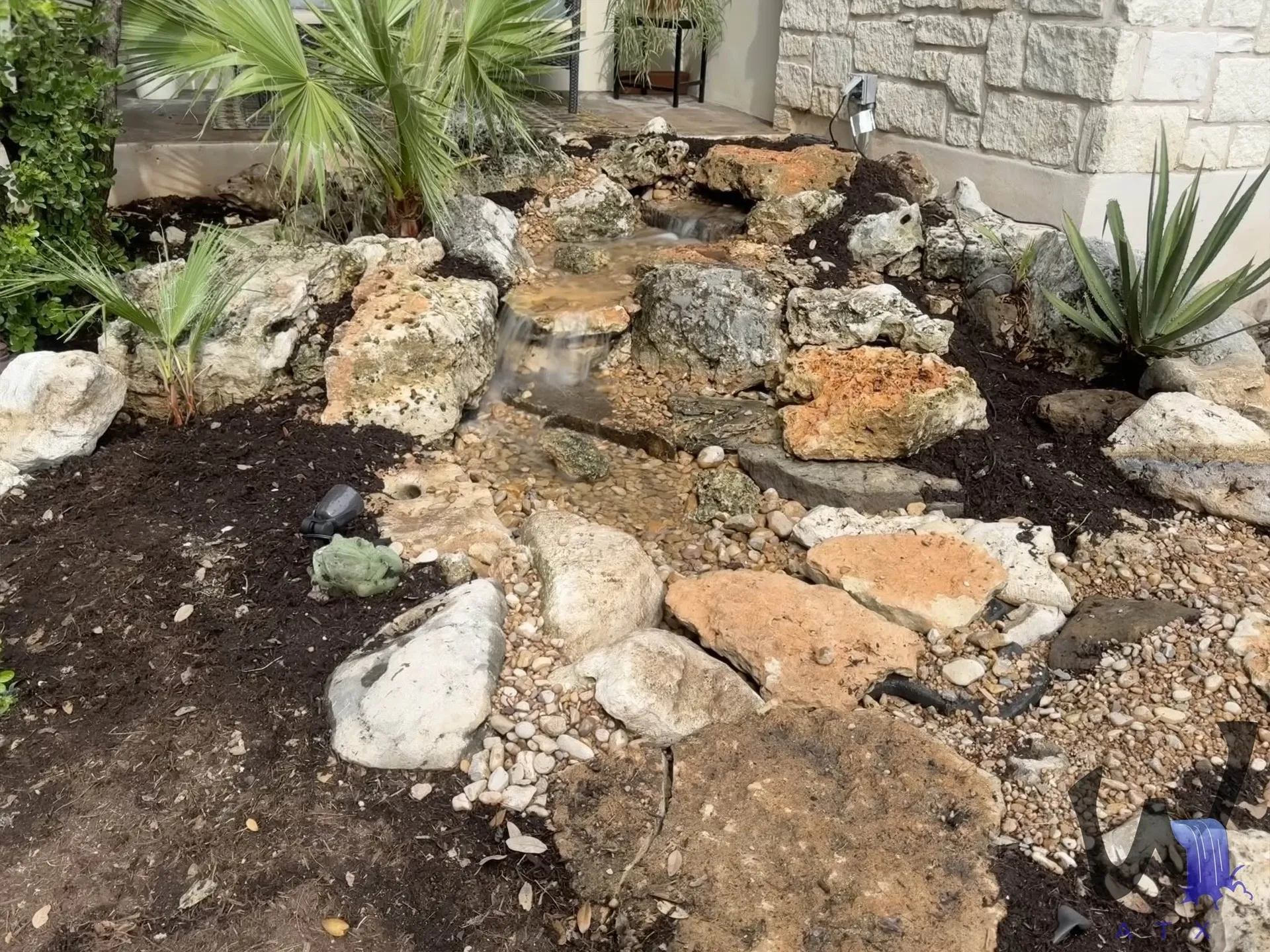Rock waterfall being rebuilt during an upgrade