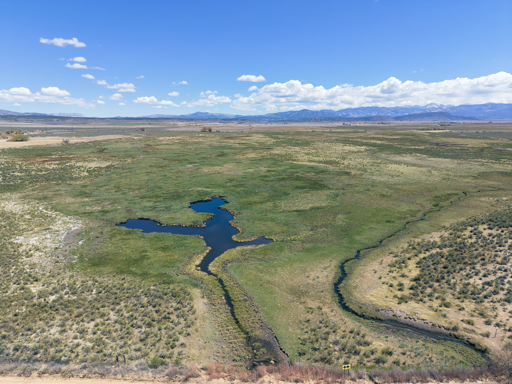 Open ranch land and mountain views in Colorado’s San Luis Valley