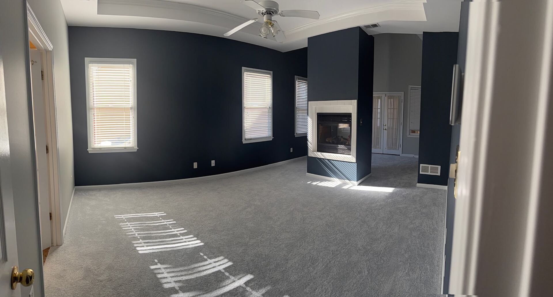Room repainted with navy walls