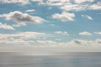 CLOUDS DRIFTING OVER LAKE MICHIGAN – Image 1