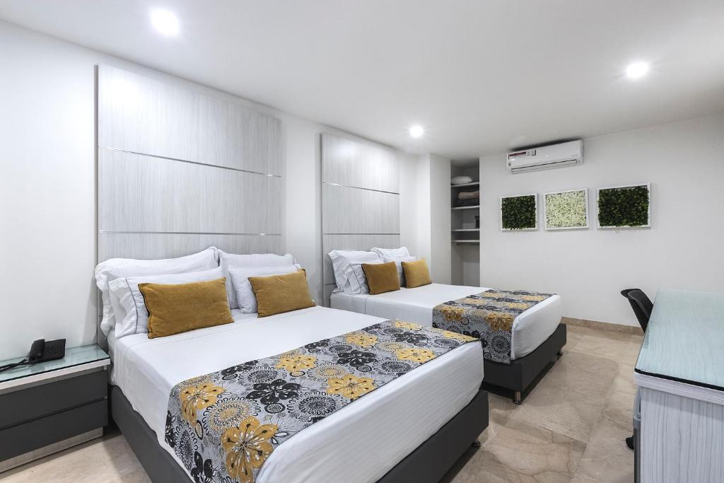 Hotel Madeiro Poblado — Triple Room | Hotel Only, Oct 9–13 – Image 1