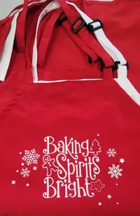 Baking Spirits Bright" Red Holiday Baking Apron – Image 1