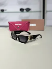 Miu Miu Sunglasses Black  – Image 2