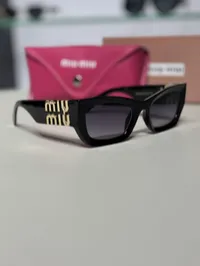 Miu Miu Sunglasses Black  – Image 4