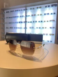 Chanel Rimless Brown Lenses – Image 1