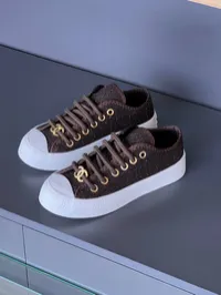 Chanel Tweed Brown Sneakers – Image 1