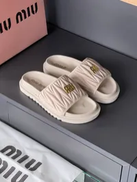Miu Miu Matelasse Nappa Slippers  – Image 1