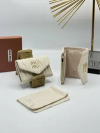 Miu Miu Matelasse Nappa Wallet – Image 1