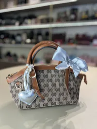 Gucci Supreme Canvas Heart Handbag  – Image 4