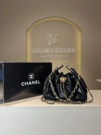 Chanel 25 Small Black Drawstring Bag – Image 1