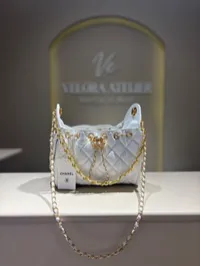 Chanel 25 Small White Drawstring Bag – Image 1