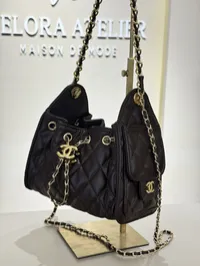 Chanel 25 Small Brown Drawstring Bag – Image 1