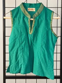 Mint Green Sleeveless Shirt – Image 1