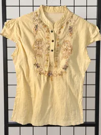 Pale Yellow Sleeveless Shirt w/ Buttons and Floral Neck – Image 1
