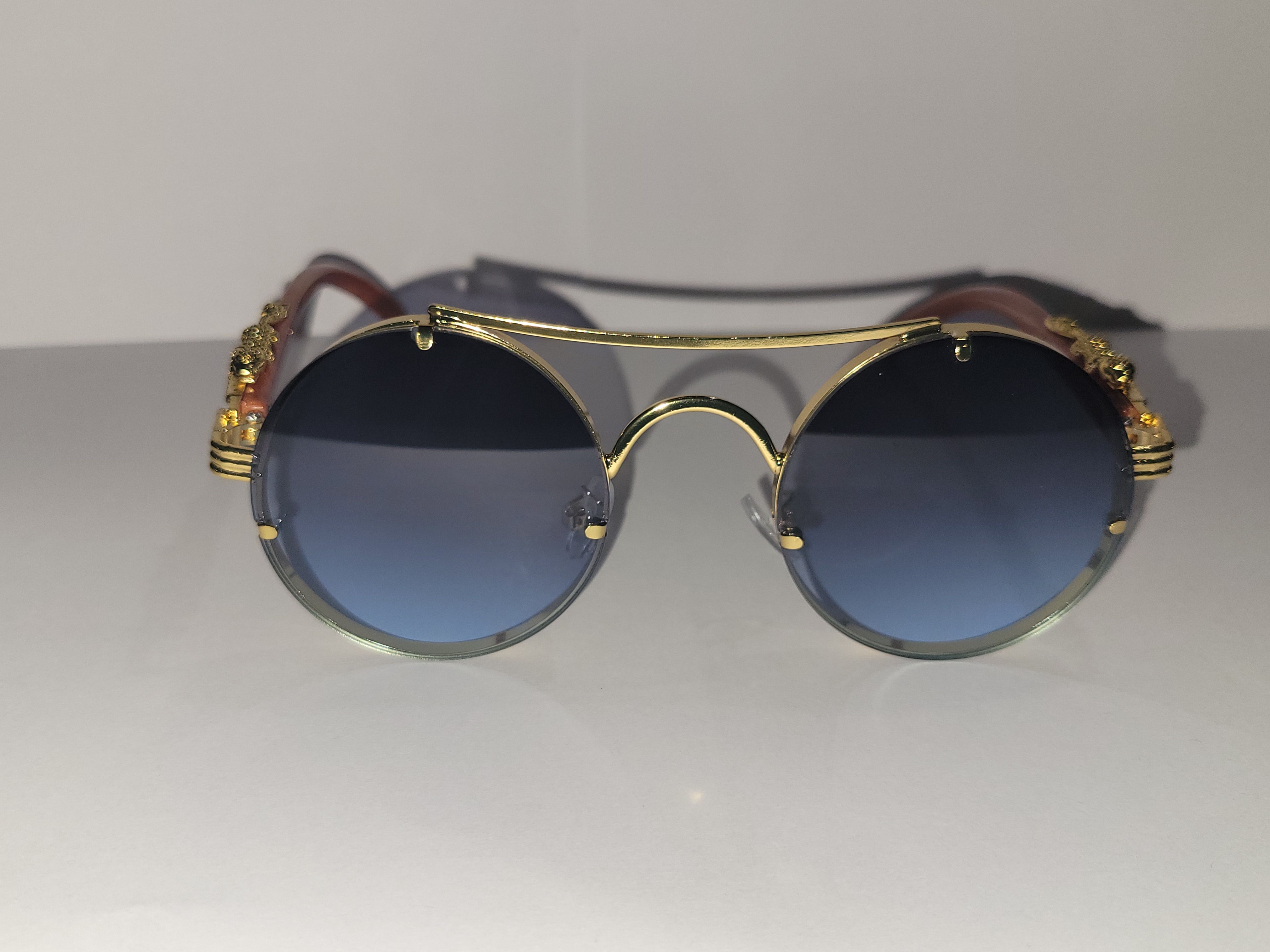 #16-Gold Framed Sunglasses with a Growl – Image 1