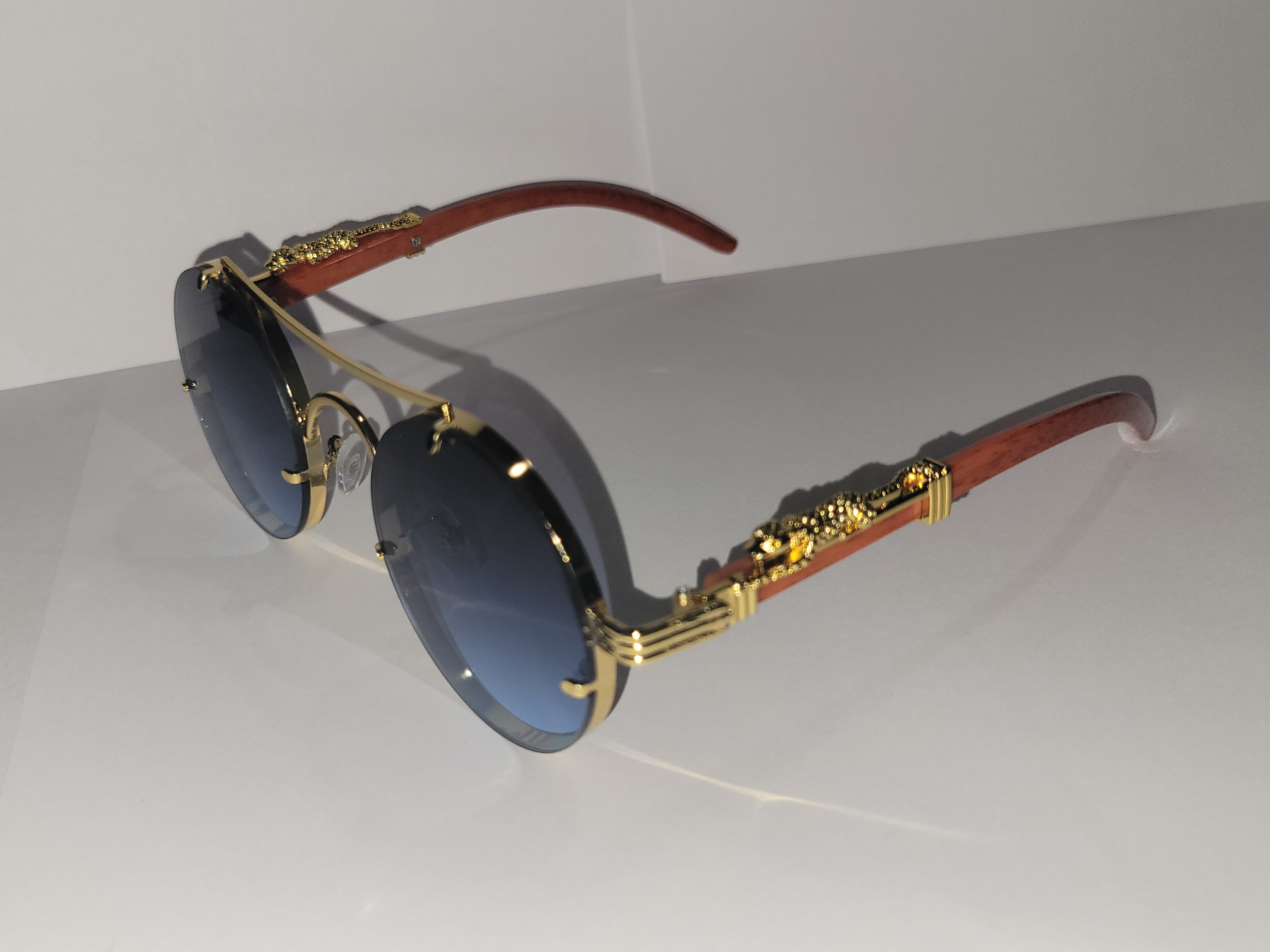 #16-Gold Framed Sunglasses with a Growl – Image 3