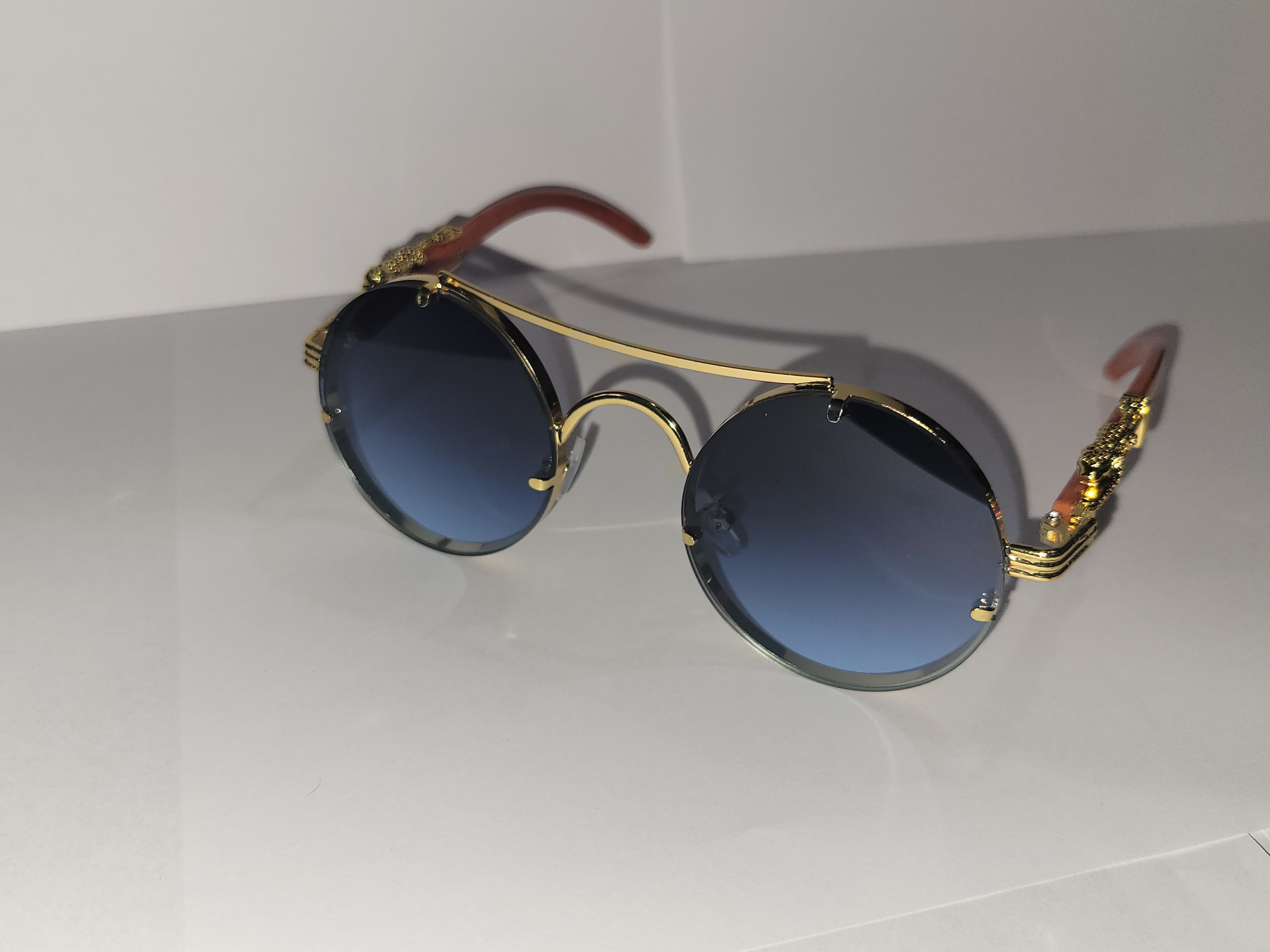 #16-Gold Framed Sunglasses with a Growl – Image 2