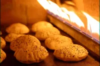 Freshly Baked Arabic Bread – Image 1