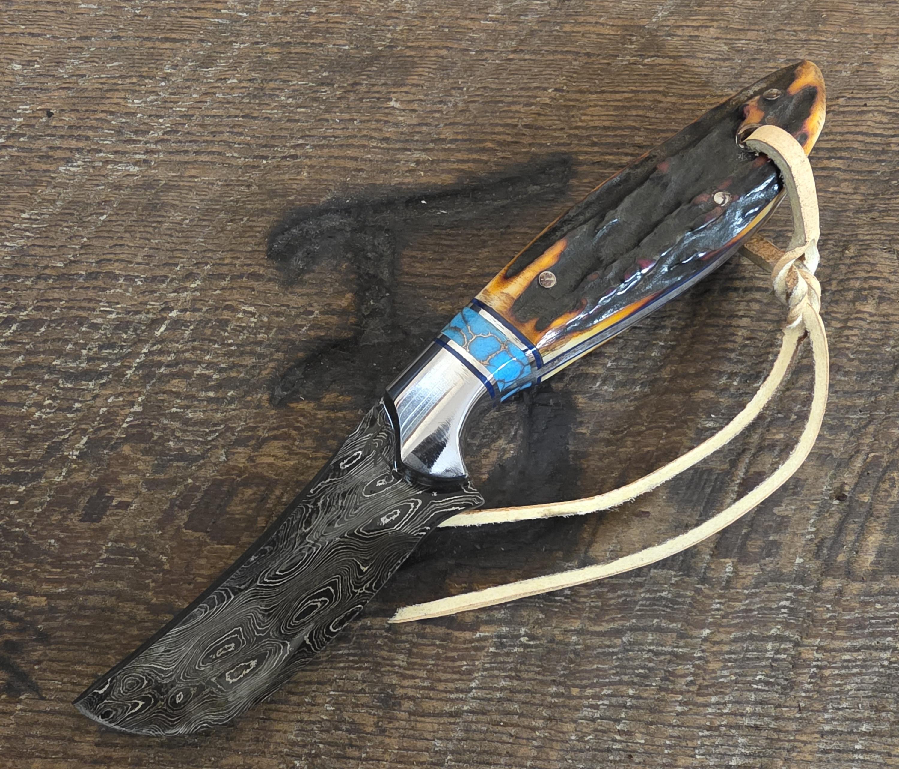 7 Inch Cowboy Hunter with Alabama Damascus Steel Blade - Turquoise Recon Stone and Stainless Inlay with Amber Dyed Sambar Stag  – Image 1