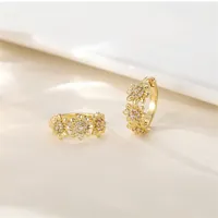 Atelier Fleur High-Quality Stainless Steel Gold Floral Pavé Huggie Earrings – Image 1
