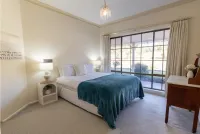 King Bed (Shared Room) - Sisterhood Explorers Retreat  – Image 1