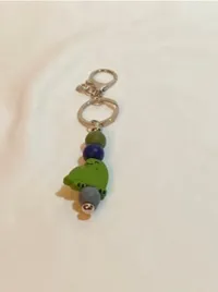 Green Dinosaur Keychain Bar – Image 1