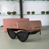 Miu Miu - Black Frame Cat eye  – Image 1