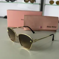 Miu Miu - Metal Frame – Image 1