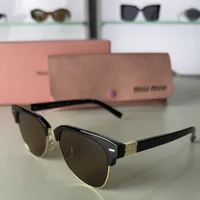 Miu Miu Unisex – Black Frame - Brown Lenses