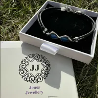 Sterling silver and leather infinity bracelet with resin middle Memorial – Image 1