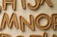 eco friendly alphabet set tan colour  – Image 1