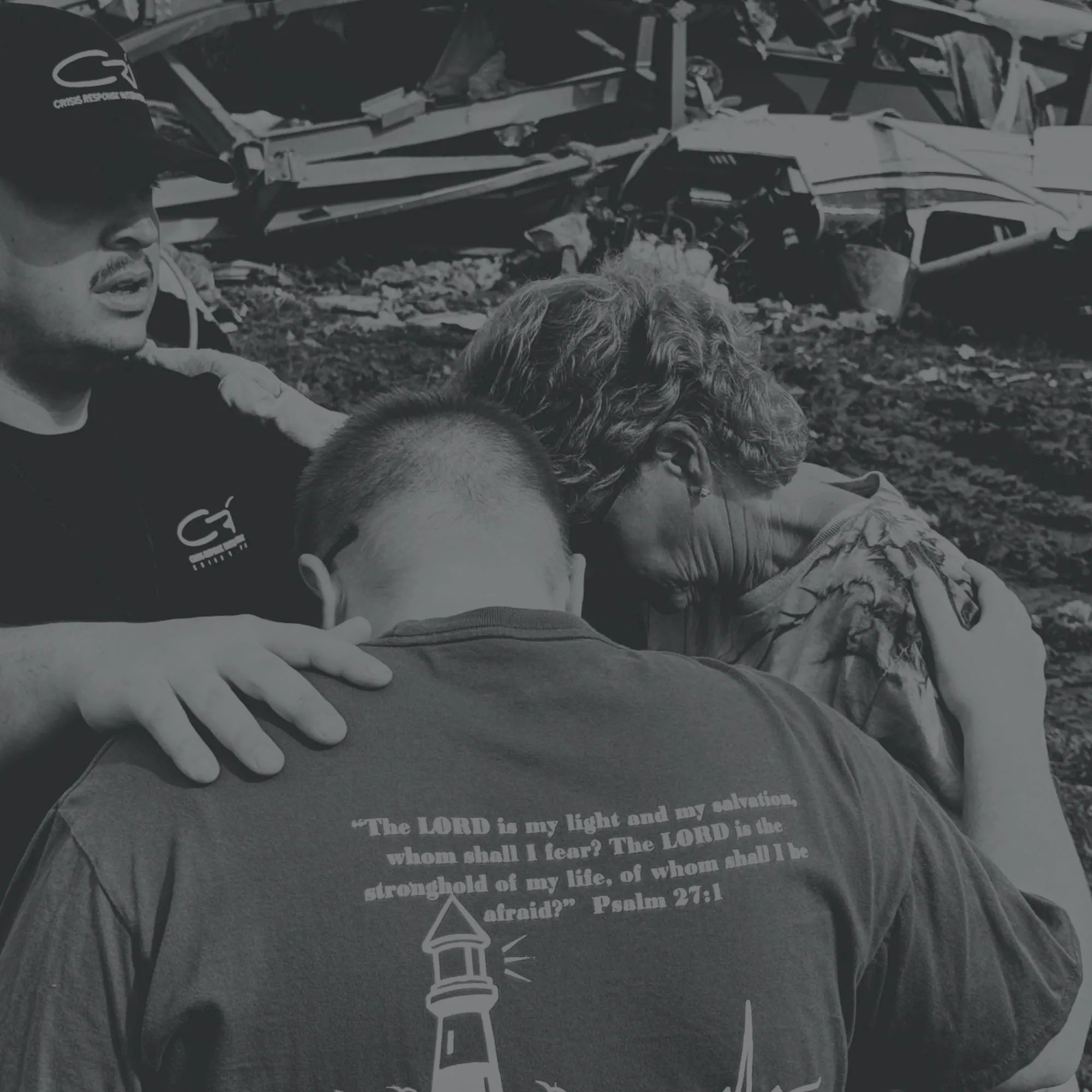 CRI responders comforting a woman after a disaster