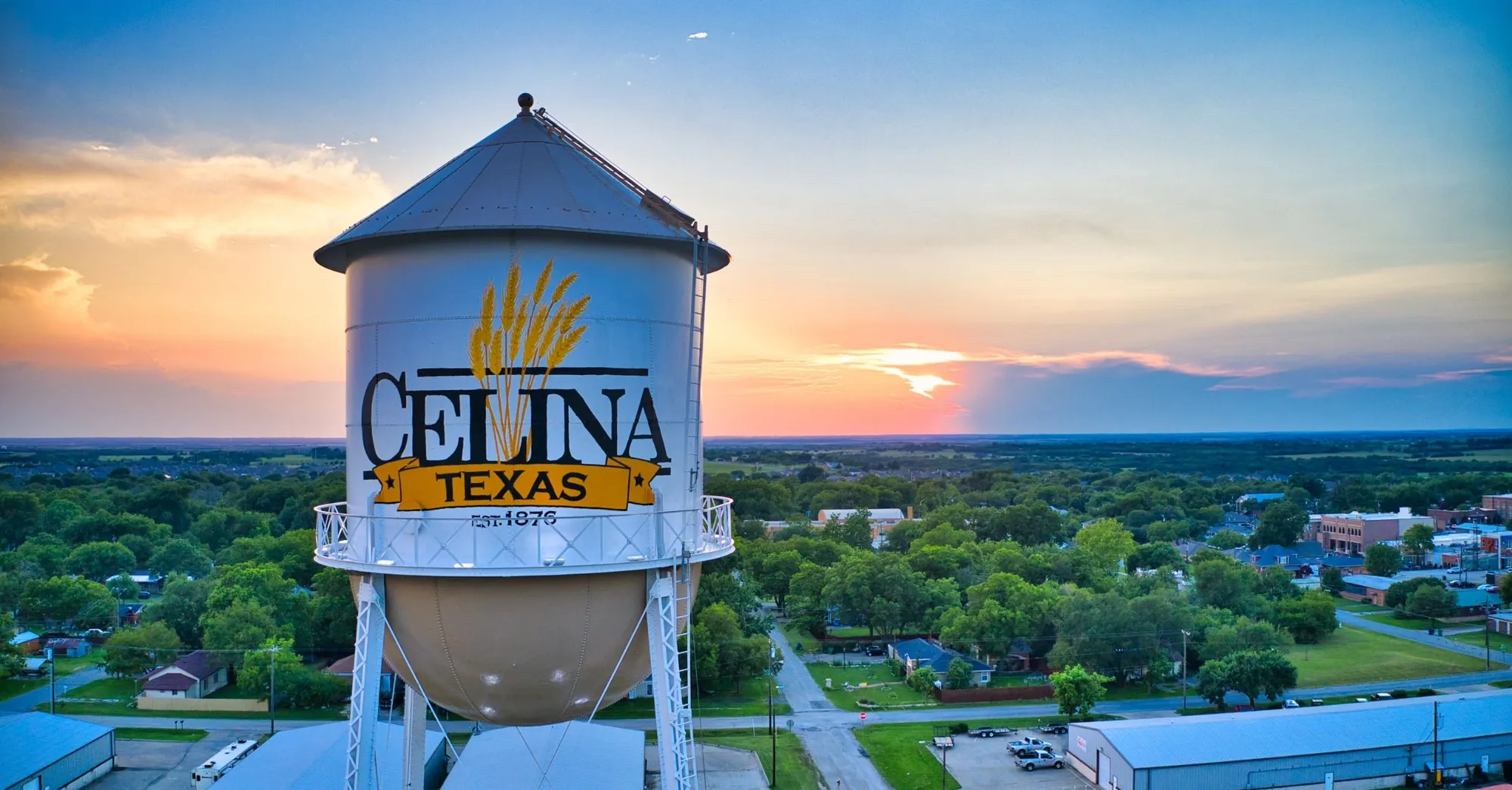 The Celina, Texas water tower over downtown at sunset