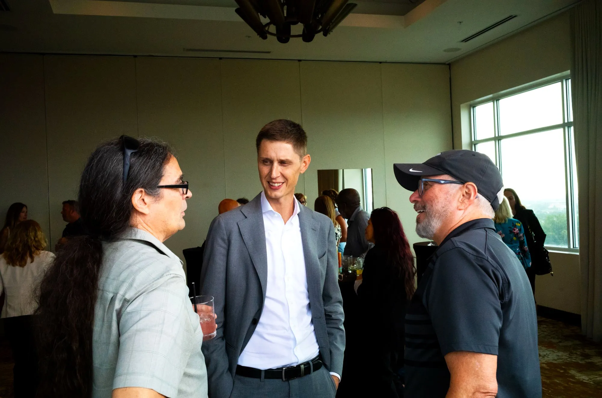 Cameron Smith talking with agents at a NXTGEN event