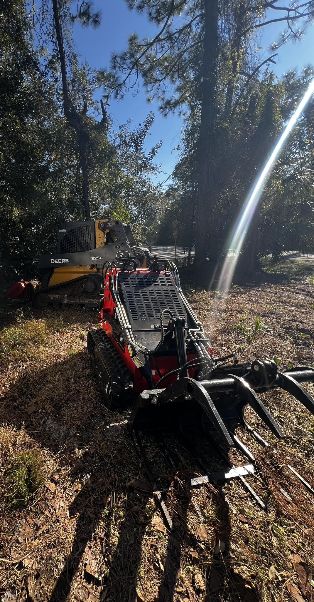 Heavy-duty tree service vehicle in residential neighborhood