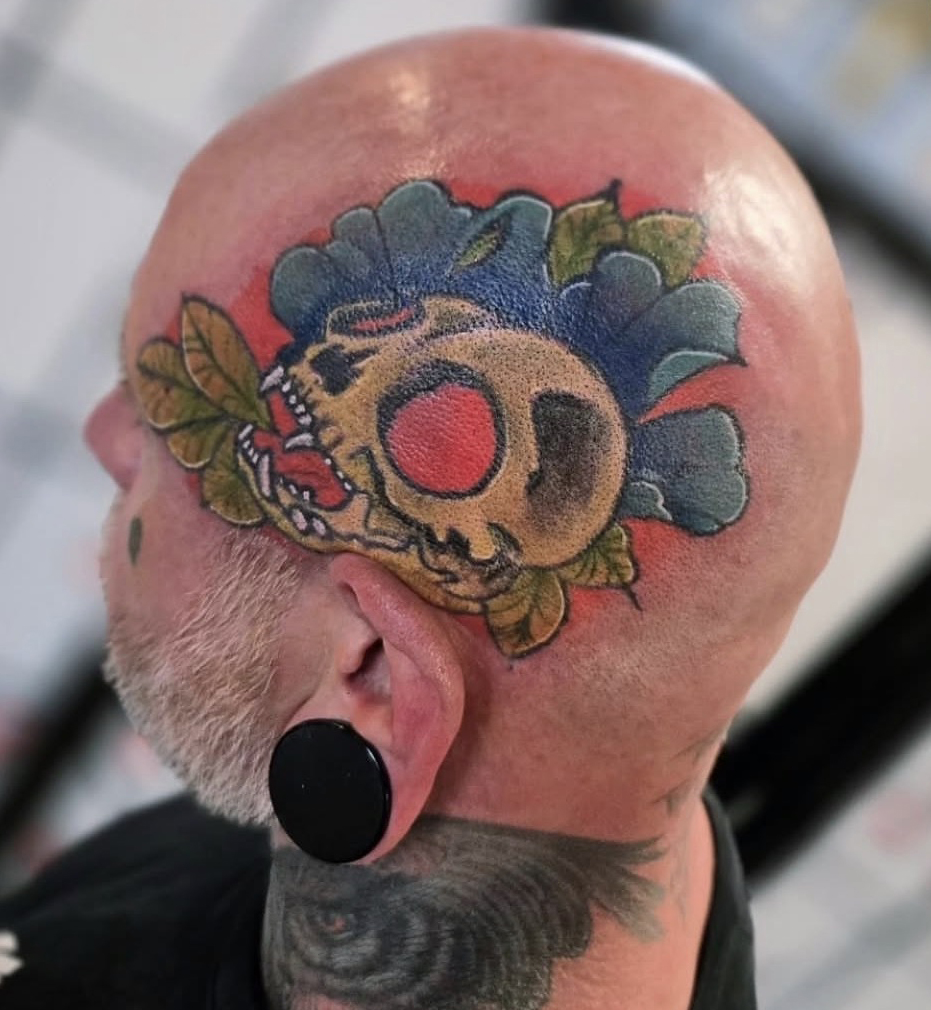 Skull on Head Tattoo