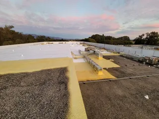 Roof Replacement vs Overlay in Bakersfield: Which Saves?