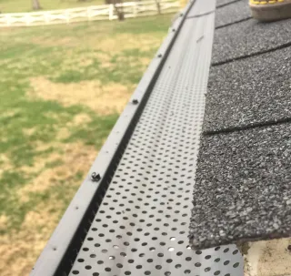 How Do Gutter Guards Reduce Maintenance Over Time?