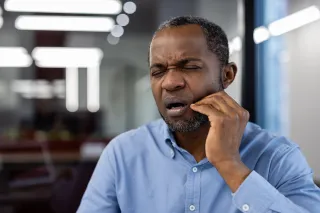 Why Your Jaw Feels Sore and Your Ear Feels Full After Clenching Through Long Zoom Meetings