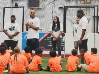 More Than a Game: Building Champions Through Service at Our 2026 Youth Football Camp!