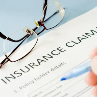 Illinois vs Iowa: How Roofing Insurance Rules Differ Across the Quad Cities