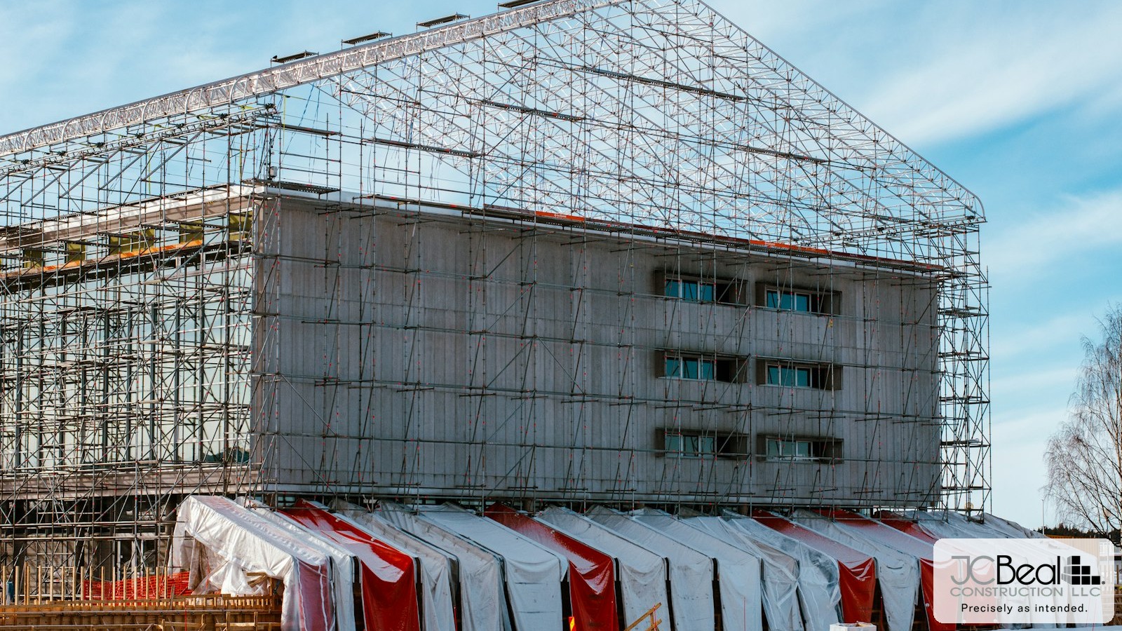 Building Through a Michigan Winter: Temporary Enclosures, Cold-Weather Masonry, and Keeping an Open Envelope on Schedule